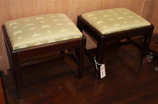 A pair of George III mahogany footstools W.31cm